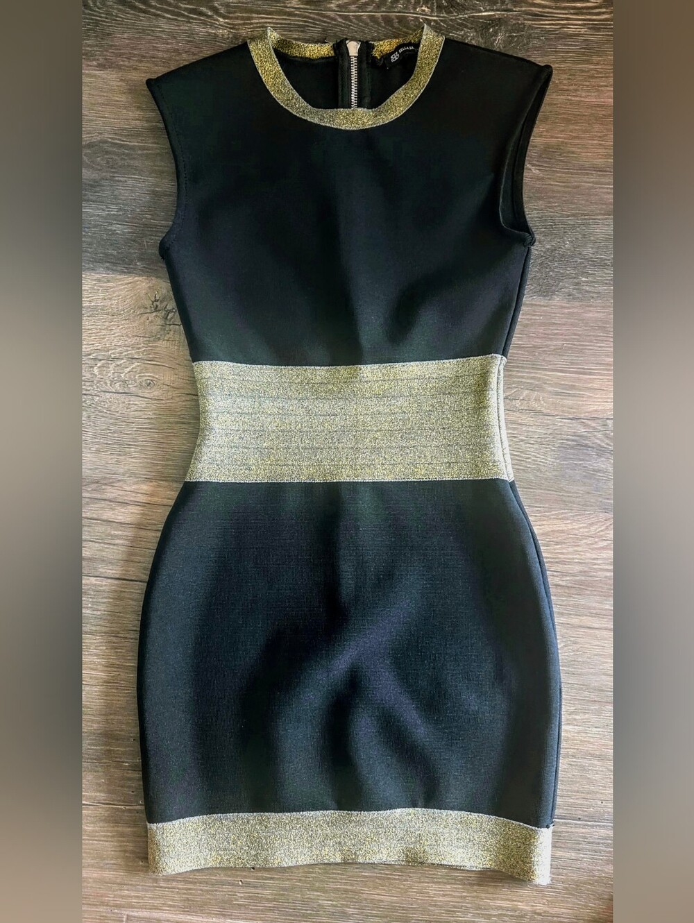 Gorgeous Bella Barnett black bandage mini dress with stunning metallic gold trim